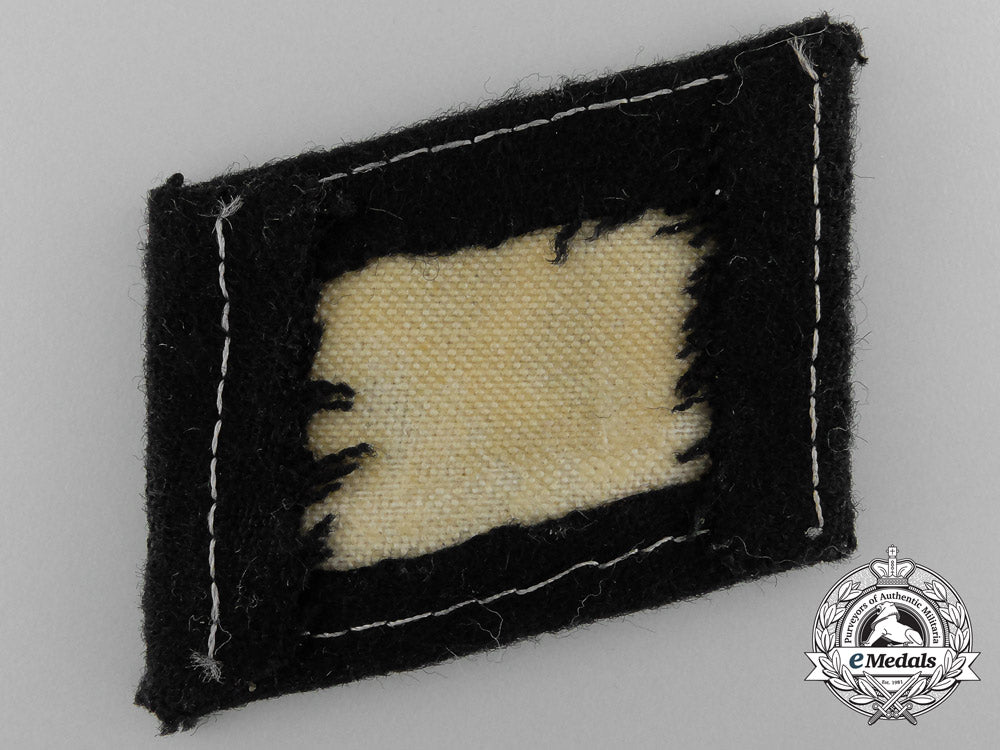 a_collar_tab_of_the11_th._panzer_grenadier_division_nordland_c_4344
