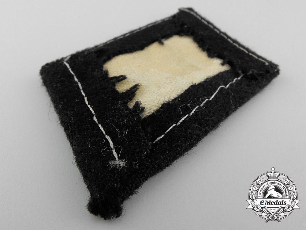 a_collar_tab_of_the11_th._panzer_grenadier_division_nordland_c_4346