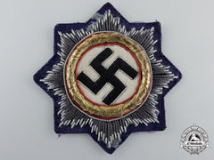 A Luftwaffe Issue German Cross In Gold; Cloth Version