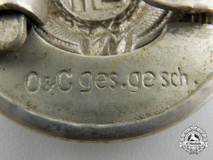 a_rare_early_ss_officer's_belt_buckle_by"_o&_c_ges._gesch._rzm"_c_489_1