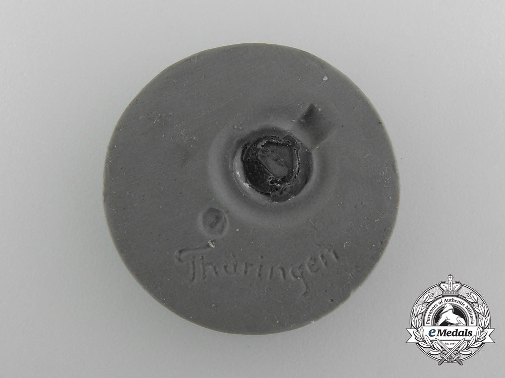 a1933/34_pommern_winter_relief_of_the_german_people_badge_c_5066