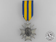 A Schwarzburg-Sondershausen Honour Cross; Fourth Class With Swords
