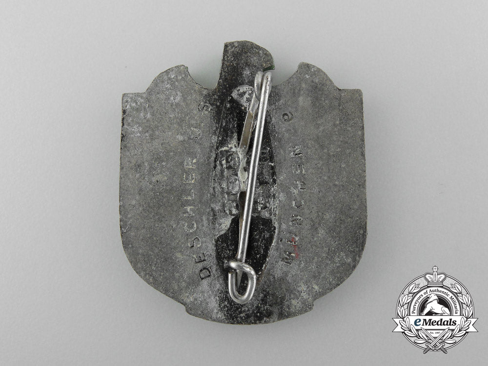 a1939_northeim_national_socialist_war_victim’s_care_job_fair_badge_by_deschler&_sohn_c_6410