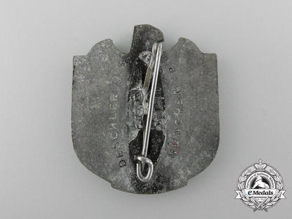 a1939_northeim_national_socialist_war_victim’s_care_job_fair_badge_by_deschler&_sohn_c_6410