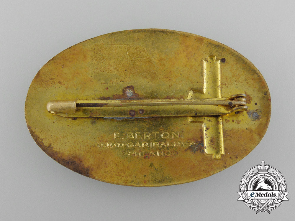 italy._a"_m"_legion_omni_badge,_by_e.bertoni_c_6597