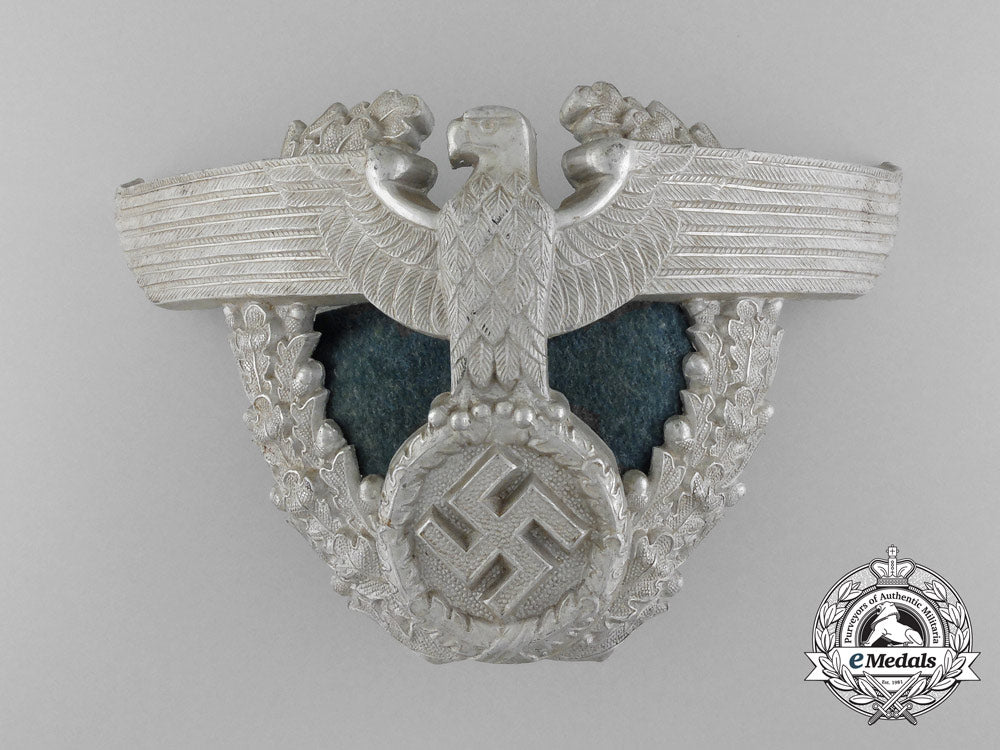 a_german_police_officer's_shako_eagle_helmet_plate_c_6853