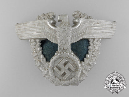 a_german_police_officer's_shako_eagle_helmet_plate_c_6853