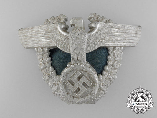 a_german_police_officer's_shako_eagle_helmet_plate_c_6853