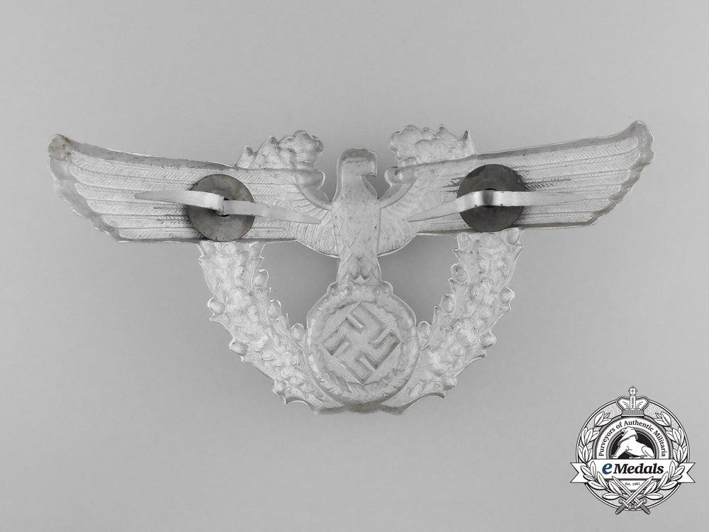 a_german_police_officer's_shako_eagle_helmet_plate_c_6855