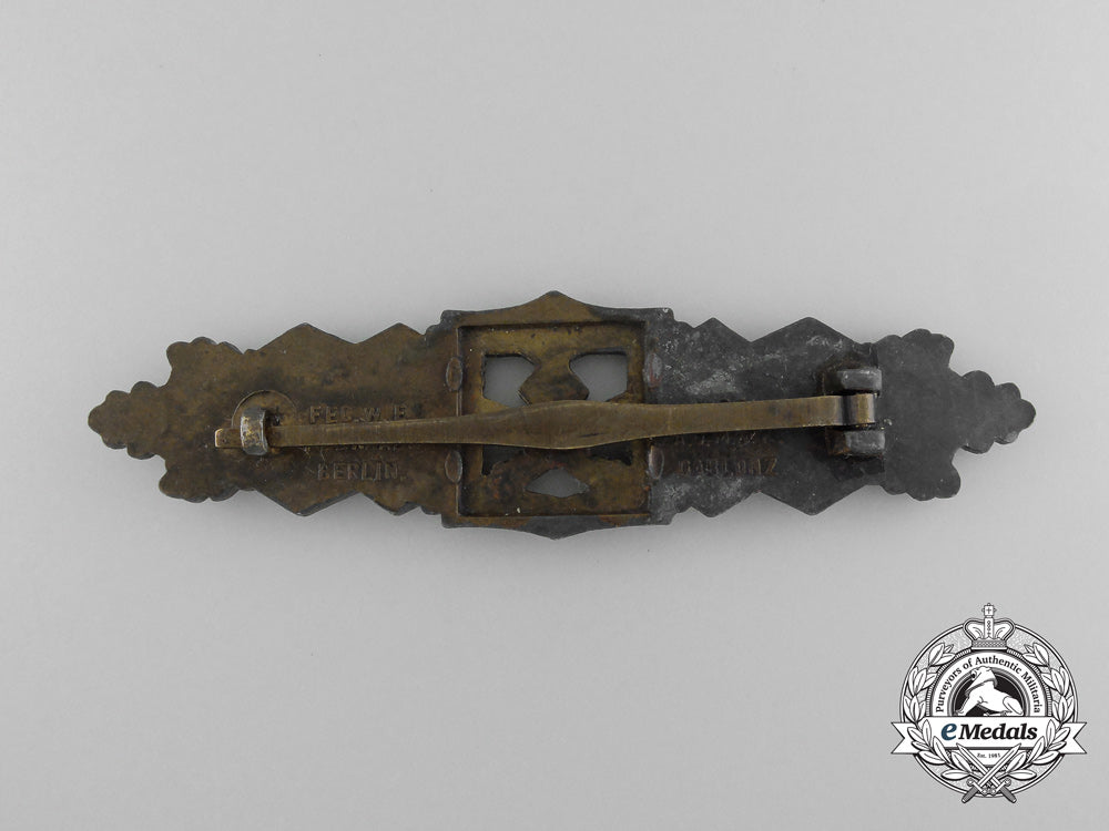 a_bronze_grade_close_combat_clasp_by_a.g.m.u.k._c_7061