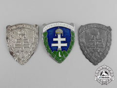 Three Hungarian Levente Cap Badges