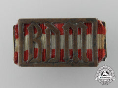 An Rzm Marked And Numbered Bdm Membership Badge