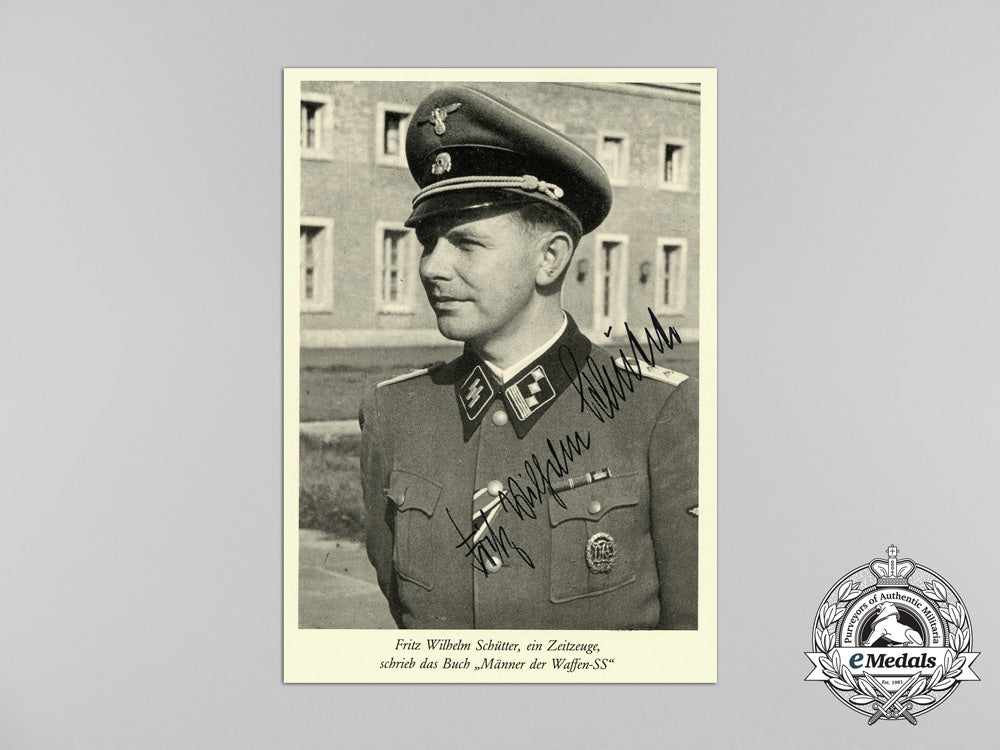 a_signed_photograph_of_fritz_schütter_with_an_advert_for_his_book“_men_of_the_waffen-_ss”_c_8384