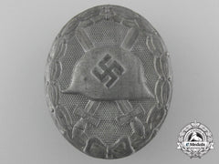 A German Second War Wound Badge By Eugen Schidthaussler; Gold Grade