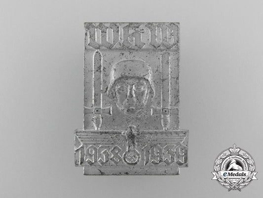 a1938/39_winter_aid_badge_by_kür_und_langer_c_8929
