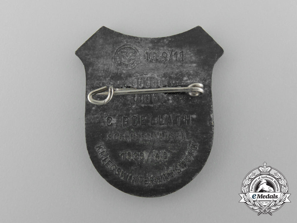a1939/1940_munich_wartime_winter_aid_badge_by_carl_poellath_c_8934