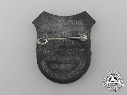 a1939/1940_munich_wartime_winter_aid_badge_by_carl_poellath_c_8934