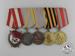 A Soviet Russian Order Of The Red Banner Medal Grouping
