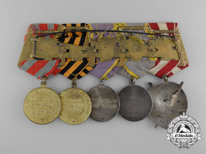 a_soviet_russian_order_of_the_red_banner_medal_grouping_c_9427