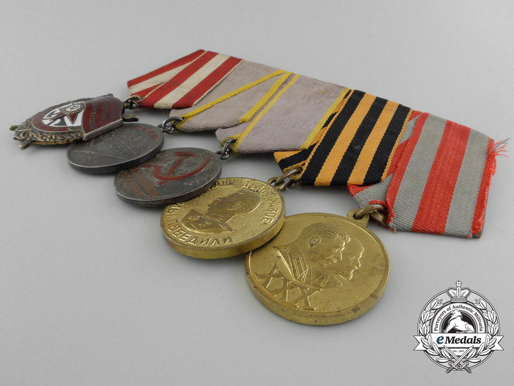 a_soviet_russian_order_of_the_red_banner_medal_grouping_c_9428