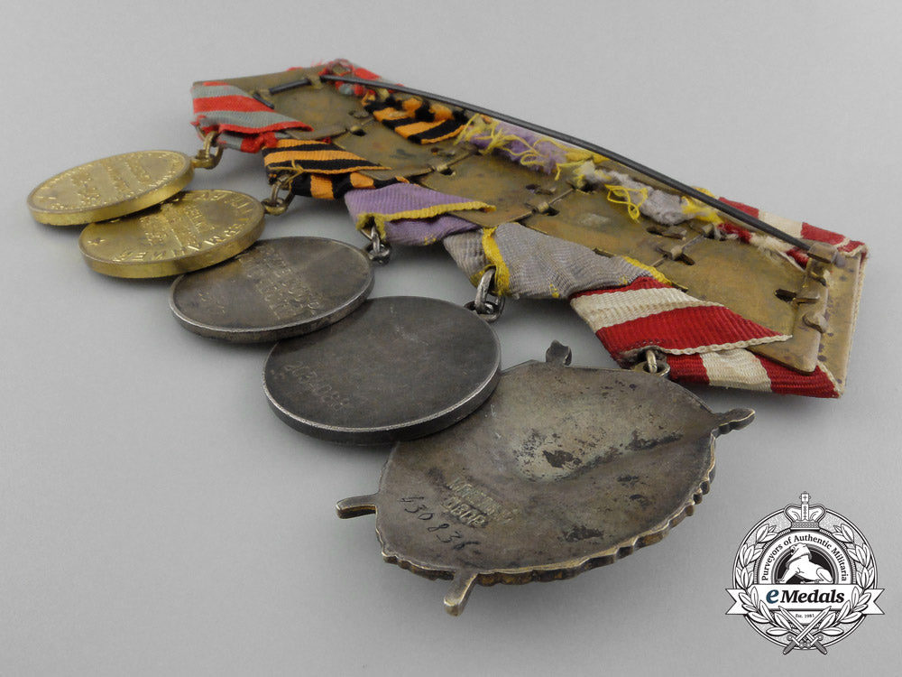 a_soviet_russian_order_of_the_red_banner_medal_grouping_c_9429