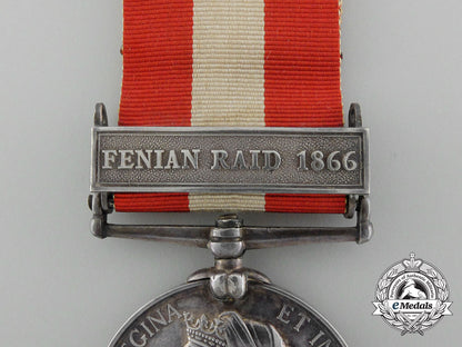 a_canada_general_service_medal_with_miniature,_photograph_of_recipient,&_carton_c_9556