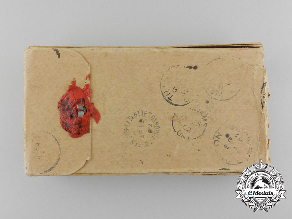 a_canada_general_service_medal_with_miniature,_photograph_of_recipient,&_carton_c_9562