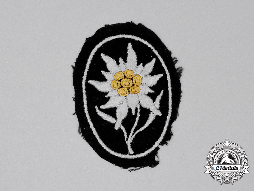 germany,_ss._an_unworn_waffen-_ss_gebirgstruppen_edelweiß_sleeve_insignia_cc_0338