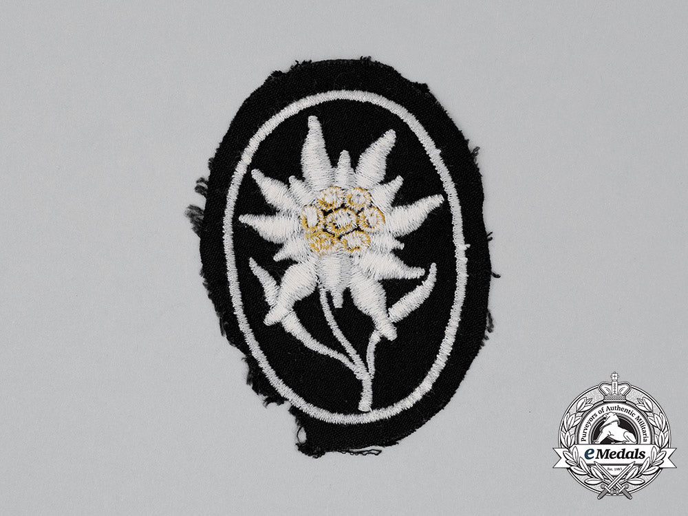 germany,_ss._an_unworn_waffen-_ss_gebirgstruppen_edelweiß_sleeve_insignia_cc_0339