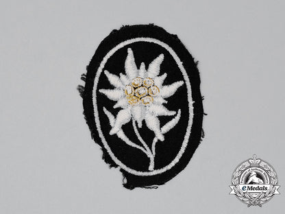 germany,_ss._an_unworn_waffen-_ss_gebirgstruppen_edelweiß_sleeve_insignia_cc_0339