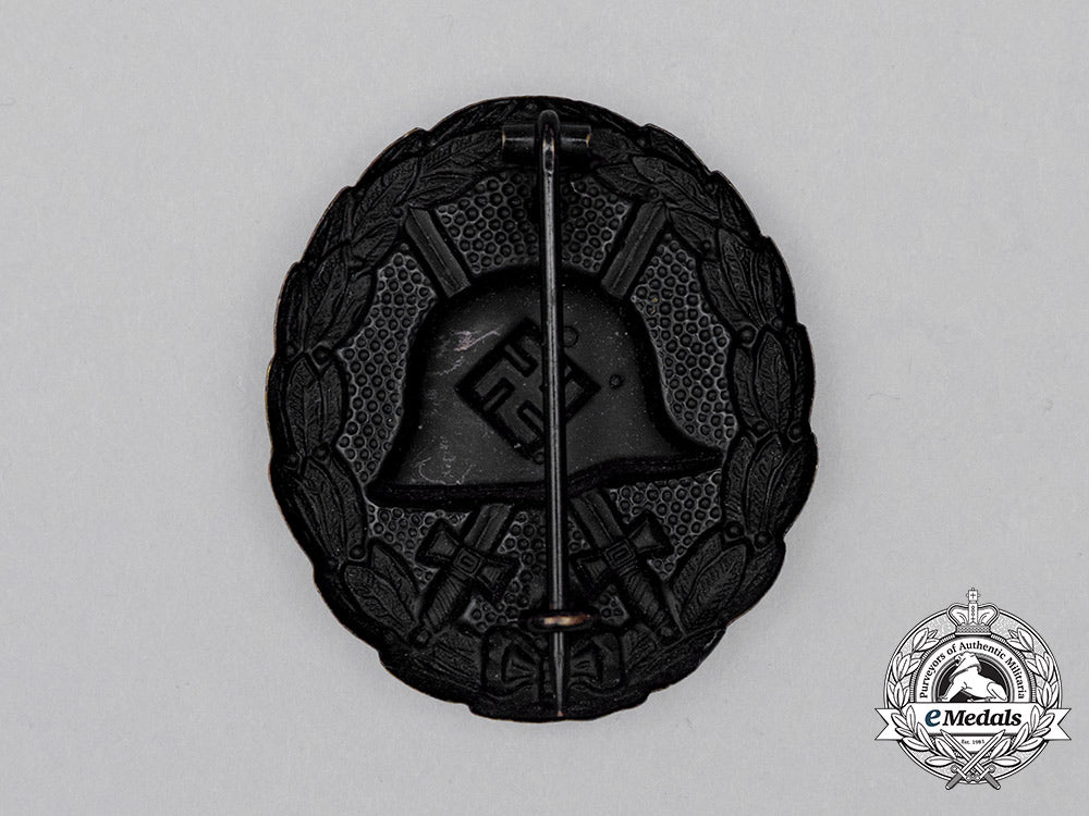 a_cased_third_reich_period_german_condor_legion_black_grade_wound_badge_cc_0850