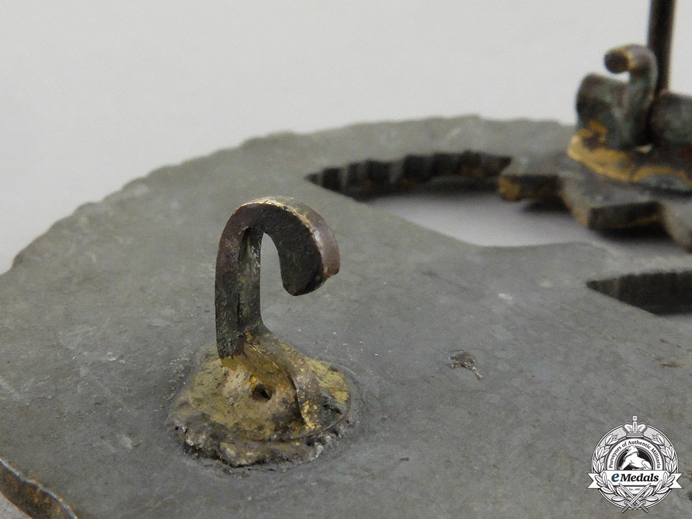 germany,_kriegsmarine._a_coastal_artillery_war_badge_by_sohni&_heubach_in_packet_of_issue_cc_1208