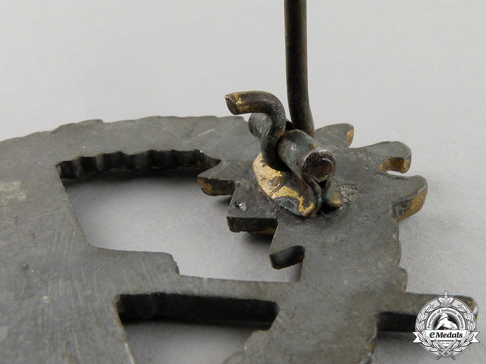 germany,_kriegsmarine._a_coastal_artillery_war_badge_by_sohni&_heubach_in_packet_of_issue_cc_1209