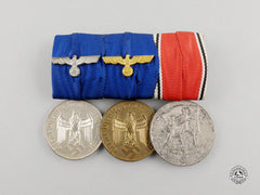 A Second War Wehrmacht Long Service & Austrian Anschluss Medal Bar Group