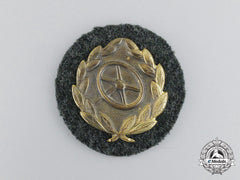 An Unissued Wehrmacht Heer (Army) Gold Grade Driver’s Proficiency Badge