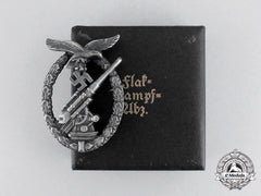 An Early War Luftwaffe Flak Badge By Juncker In Its Case Of Issue