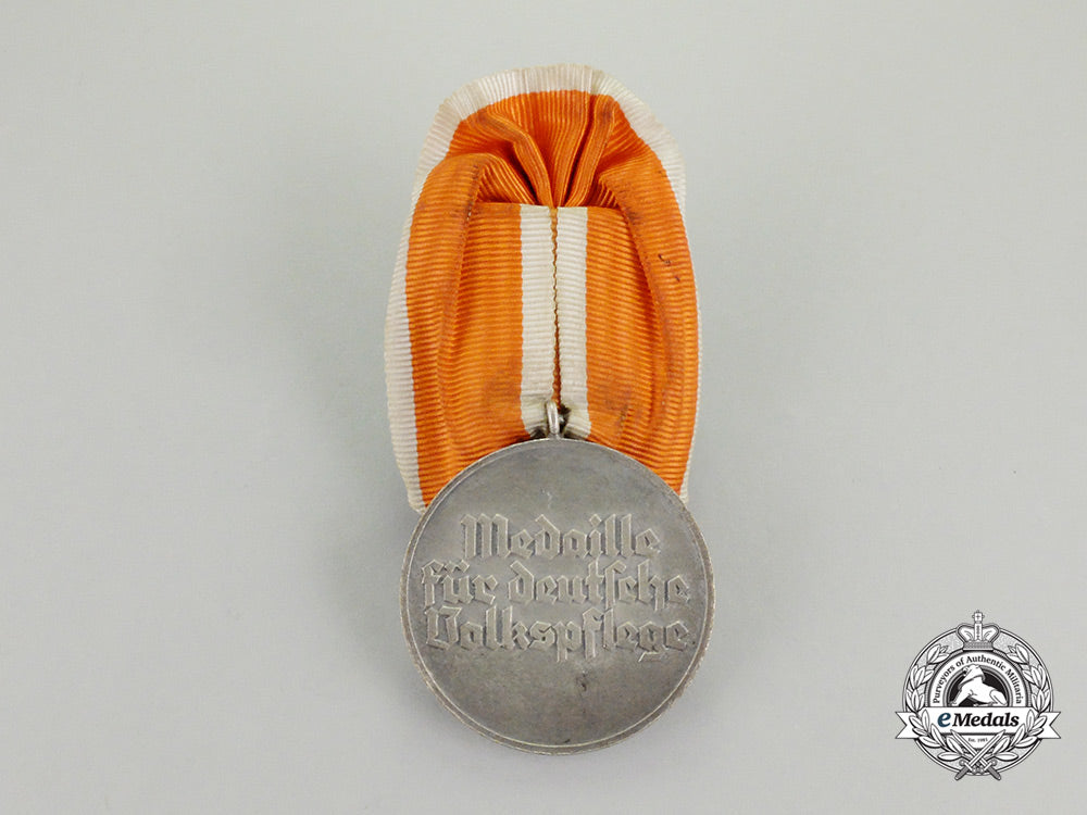 germany._a_parade_mounted_social_welfare_decoration_cc_2094