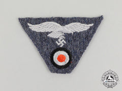 A Mint And Unissued Luftwaffe Em/Nco’s M43 Trapezoid Cap Insignia