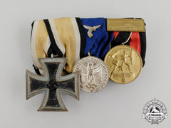 A Second War German Iron Cross 1939 Second Class And Luftwaffe Long Service Medal Bar