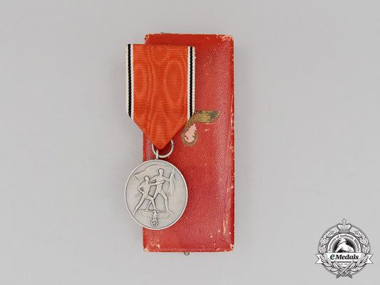 an_austrian_anschluss_commemorative_medal_for_march13,1938_in_its_case_of_issue_cc_2448_2_1