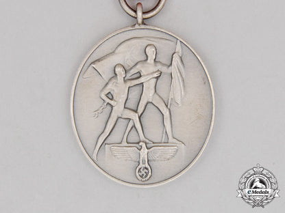 an_austrian_anschluss_commemorative_medal_for_march13,1938_in_its_case_of_issue_cc_2452_2_1