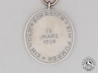 an_austrian_anschluss_commemorative_medal_for_march13,1938_in_its_case_of_issue_cc_2453_2_1