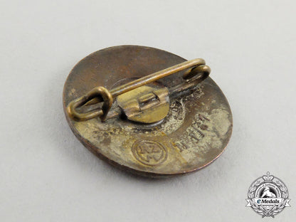 a_nsdap_party_member’s_lapel_badge_by_karl_schenker_cc_2640