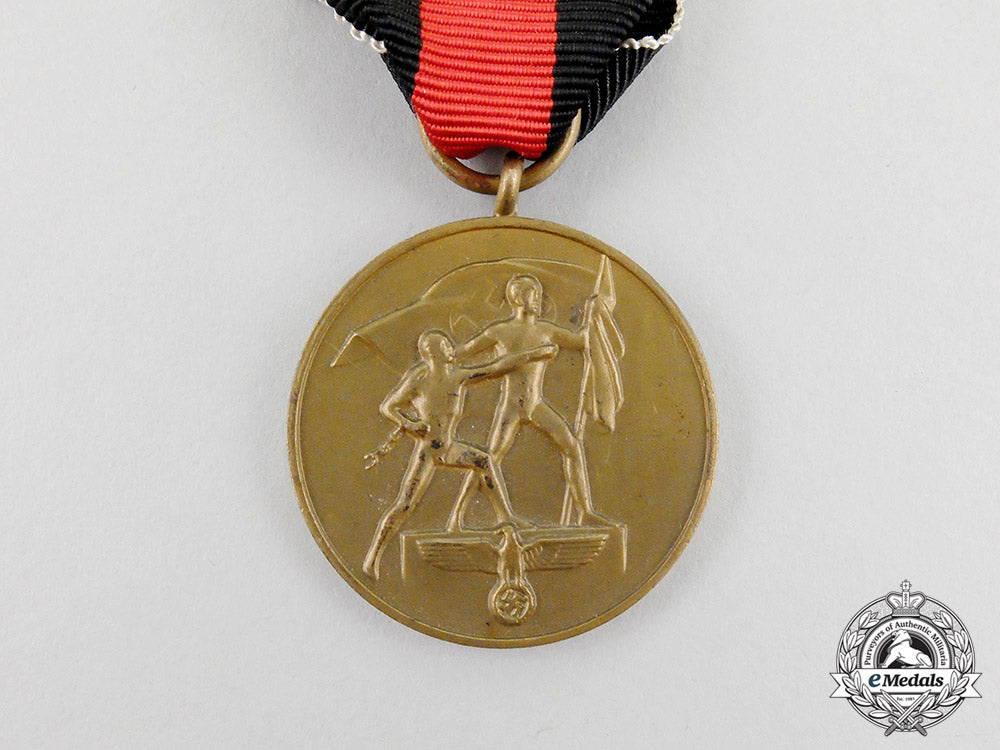 an_entry_into_the_sudetenland_commemorative_medal_in_its_packet_of_issue_cc_3010