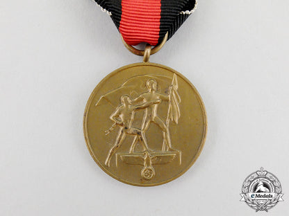 an_entry_into_the_sudetenland_commemorative_medal_in_its_packet_of_issue_cc_3010
