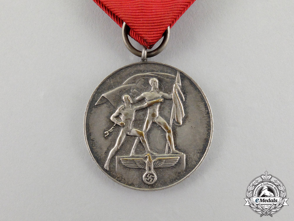 a_commemorative_anschluss_of_austria_medal_in_its_case_of_issue_cc_3110