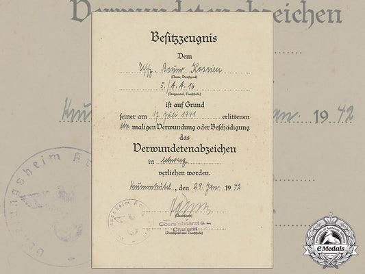 a_wound_badge_in_black_document_to_nco_bruno_kasrien;_battle_of_uman_cc_3539