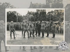 A Third Reich Period Photo Of Two Officers Reviewing Troops