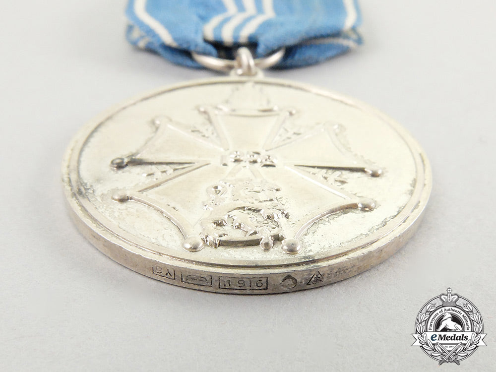 a_finnish_xv_summer_olympic_games_merit_medal1952_cc_4596_1_1