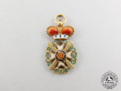 a_fine_miniature_serbian_order_of_takovo_in_gold_cc_4780